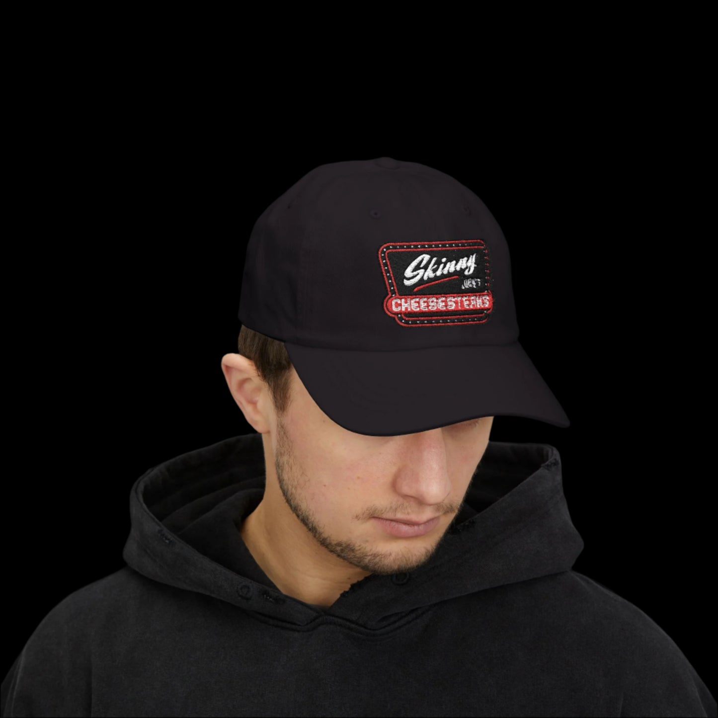 Skinny Joey Merlino hat, Skinny Joey merch, Joey Merlino hat, Philly cheesesteak hat, Skinny Joey’s Cheesesteaks streetwear, Joey Merlino apparel, The Skinny Podcast hat, mob-inspired fashion, South Philly cap, Skinny Joey red logo hat.