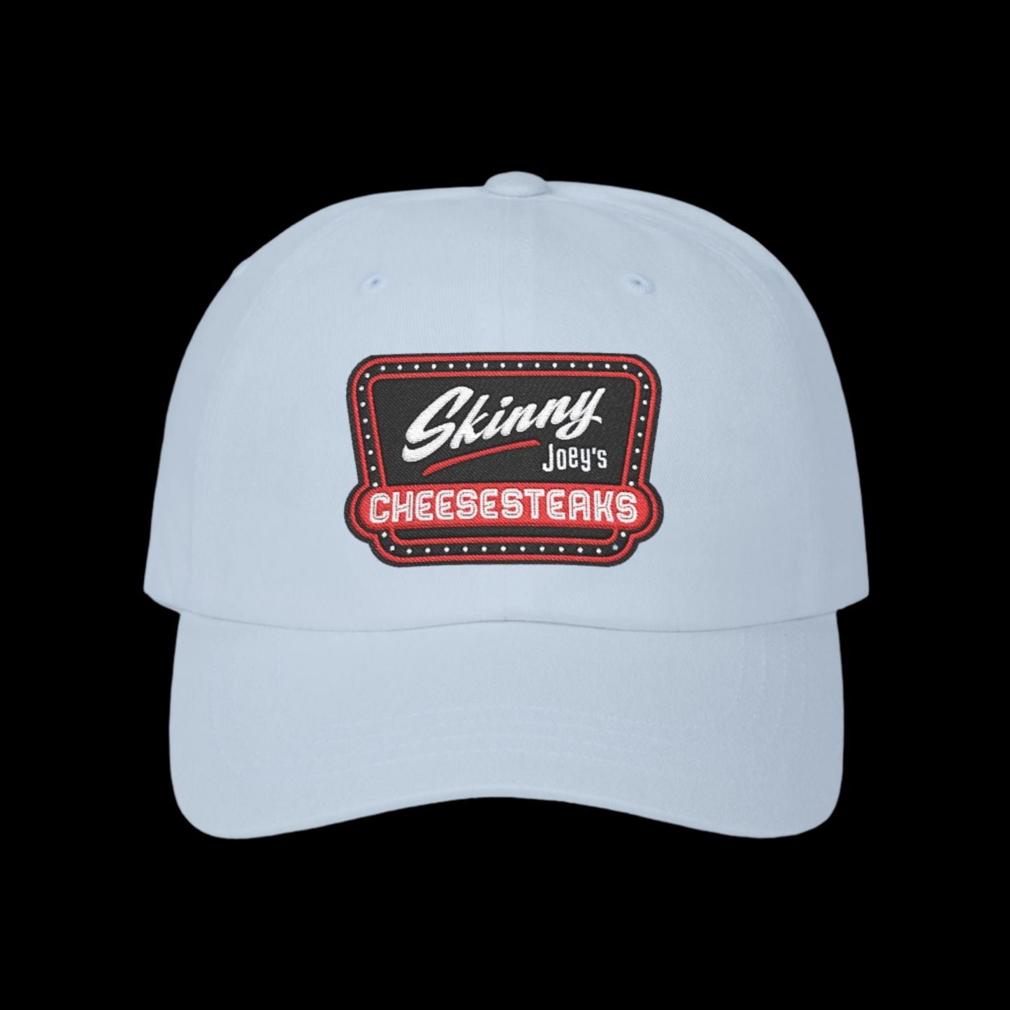 Light blue cap with 'Skinny Joey's Cheesesteaks' logo on a black background.Skinny Joey Merlino hat, Skinny Joey merch, Joey Merlino hat, Philly cheesesteak hat, Skinny Joey’s Cheesesteaks streetwear, Joey Merlino apparel, The Skinny Podcast hat, mob-inspired fashion, South Philly cap, Skinny Joey red logo hat.