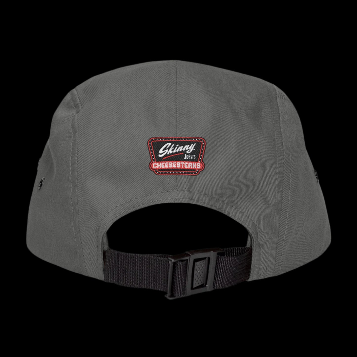 Gray cap with a logo on the back against a white background.Skinny Joey Merlino 5-panel hat featuring official Skinny Joey Merlino logo, perfect for fans of Skinny Joey Merlino, Skinny Joey’s Cheesesteaks, and The Skinny with Joey Merlino Podcast. This Skinny Joey Merlino cap blends South Philly street style with classic Skinny Joey Merlino fashion. A must-have for Joey Merlino supporters, real ones, and anyone loyal to Skinny Joey Merlino’s legacy