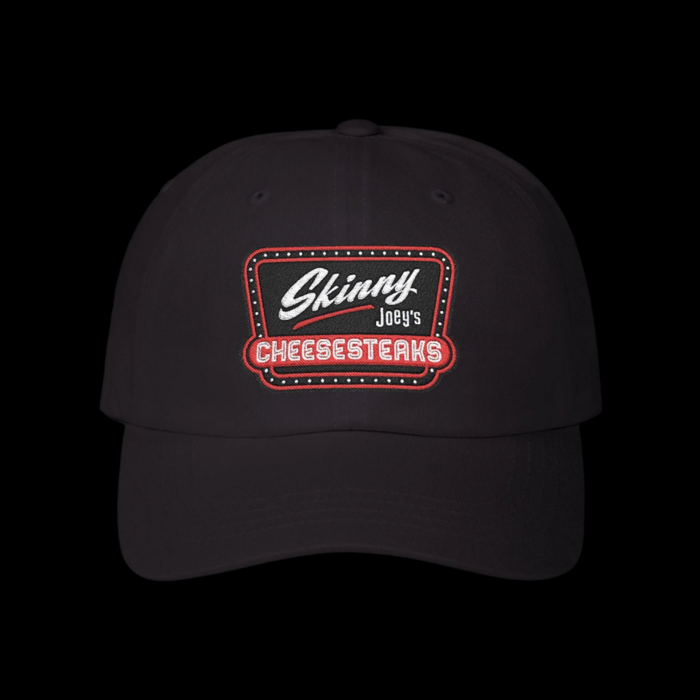 Black cap with 'Skinny Joey's Cheesesteaks' logo on a white background.Skinny Joey Merlino hat, Skinny Joey merch, Joey Merlino hat, Philly cheesesteak hat, Skinny Joey’s Cheesesteaks streetwear, Joey Merlino apparel, The Skinny Podcast hat, mob-inspired fashion, South Philly cap, Skinny Joey red logo hat.