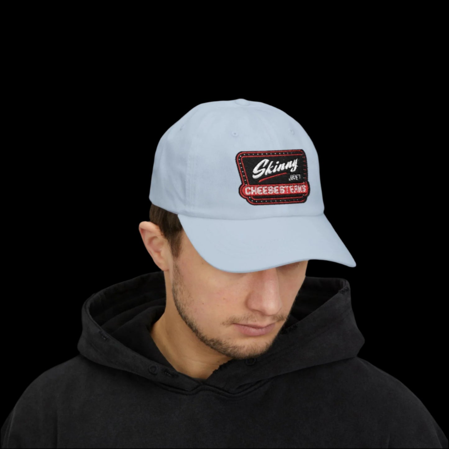 Skinny Joey Merlino hat, Skinny Joey merch, Joey Merlino hat, Philly cheesesteak hat, Skinny Joey’s Cheesesteaks streetwear, Joey Merlino apparel, The Skinny Podcast hat, mob-inspired fashion, South Philly cap, Skinny Joey red logo hat.
