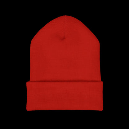 Red beanie hat on a black background