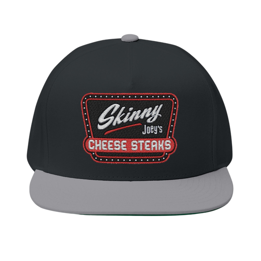 Black and gray cap with 'Skinny Joey's Cheese Steaks' logo on a white background
