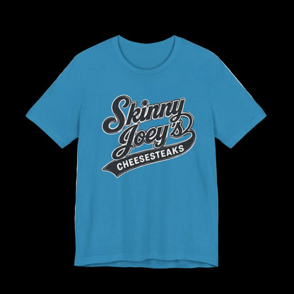 Blue t-shirt with 'Skinny Joey's Cheesesteaks' text on a white background