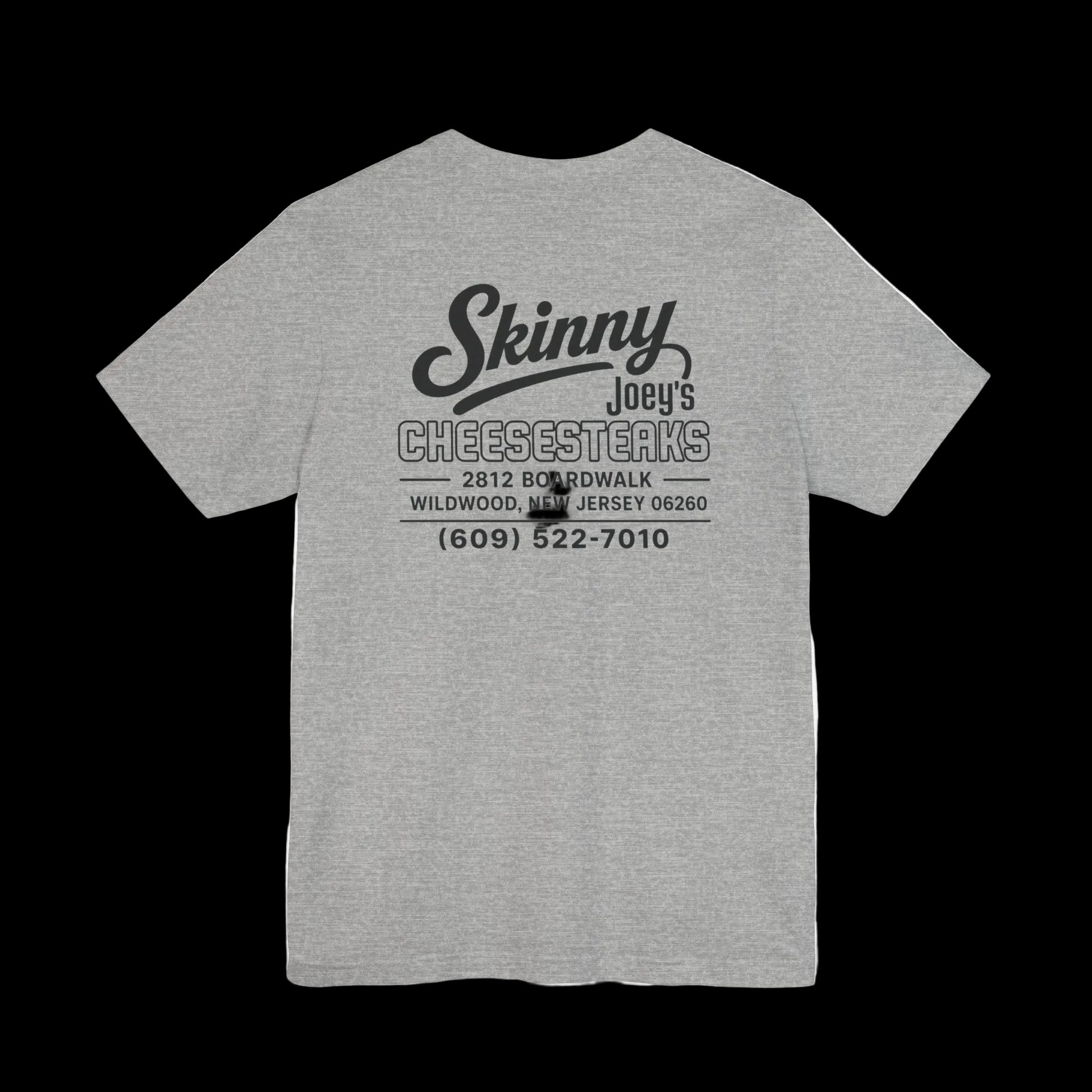 Gray t-shirt with motivational text and cross graphic on a white background