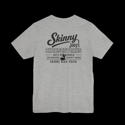 Gray t-shirt with motivational text and cross graphic on a white background