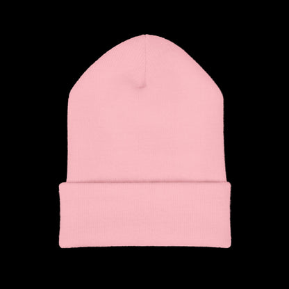 Pink beanie hat on a black background
