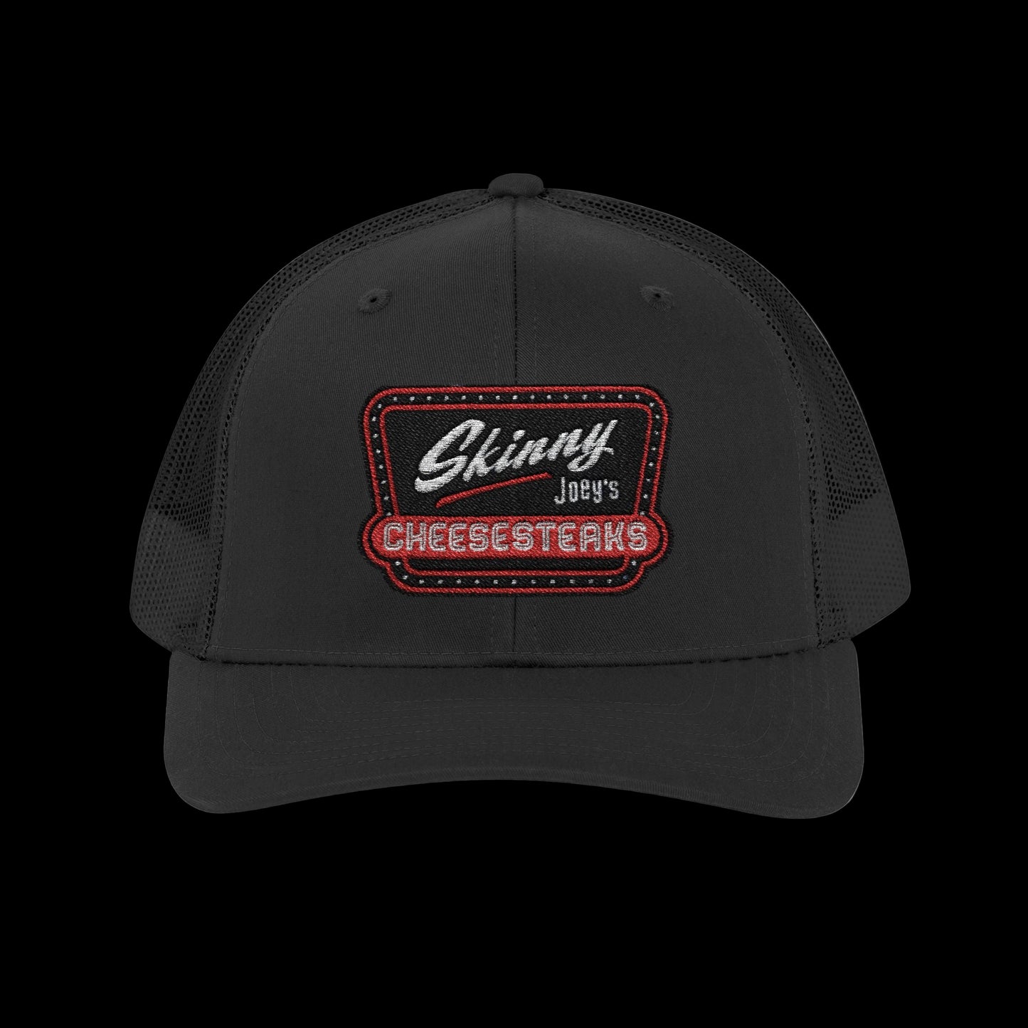 Black cap with 'Skinny Joey's Cheesesteaks' logo on a white background