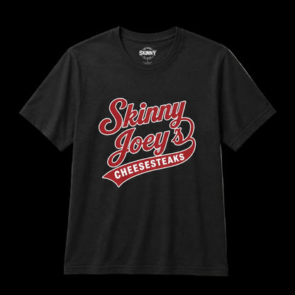 Black t-shirt with 'Skinny Joey's Cheesesteaks' text on a light gray background
