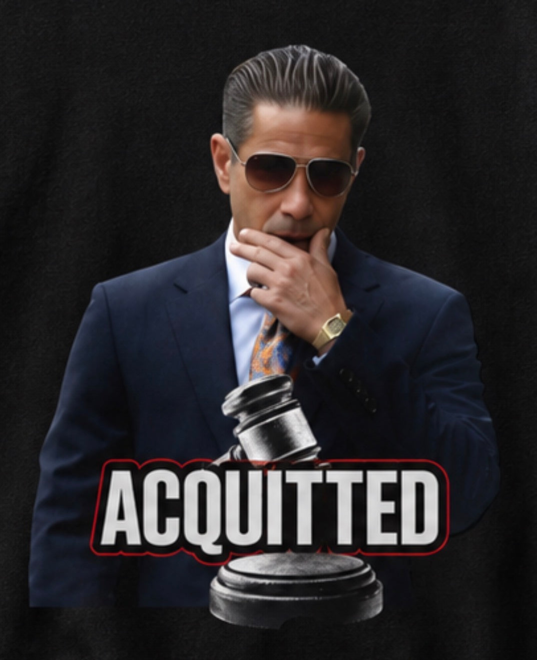 A man in a navy suit, white shirt, and patterned tie wearing aviator sunglasses, posed against a black background with a gavel and the word 'ACQUITTED' overlaid across the lower portion.
