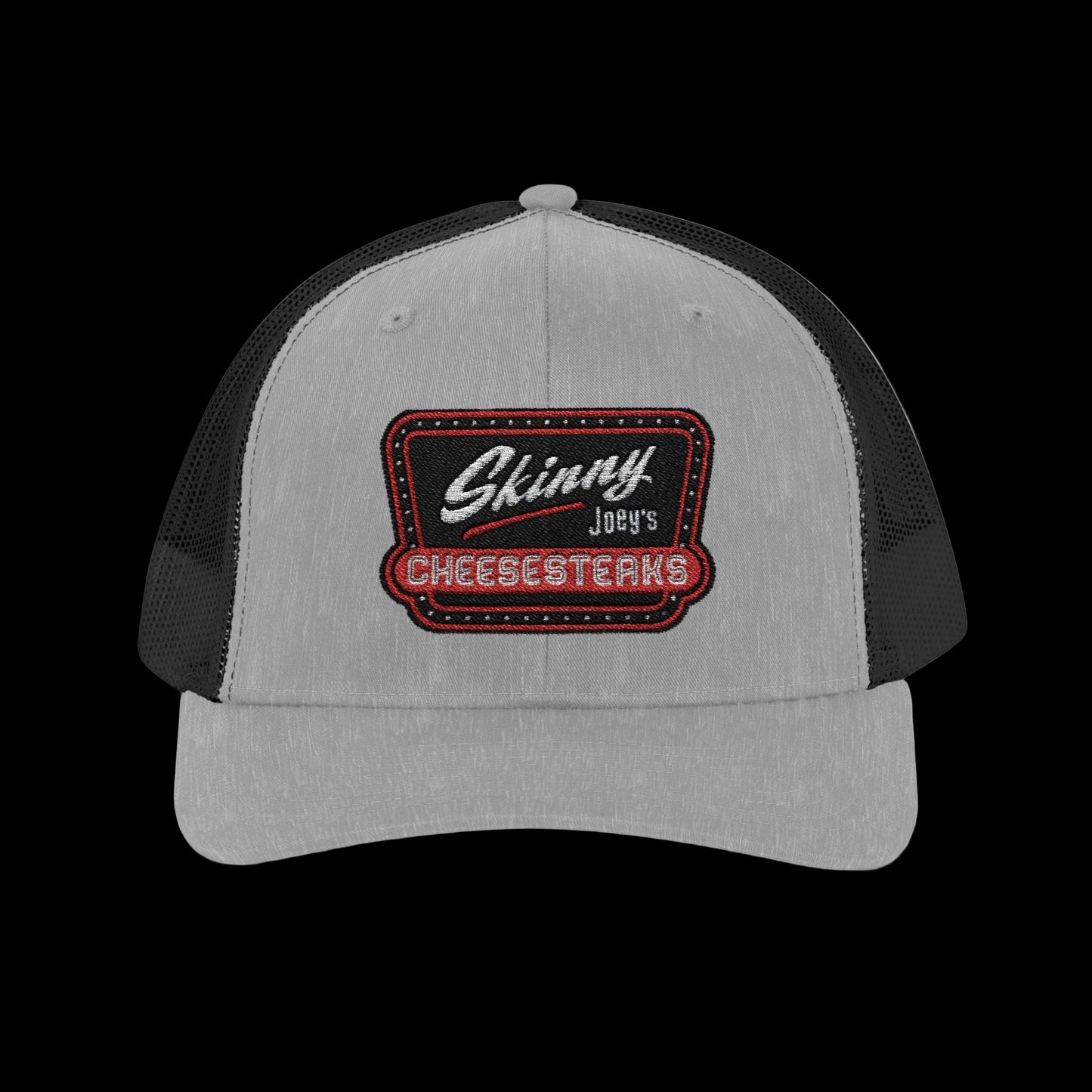 Gray and black trucker cap with 'Skinny Joey's Cheesesteaks' logo on a white background