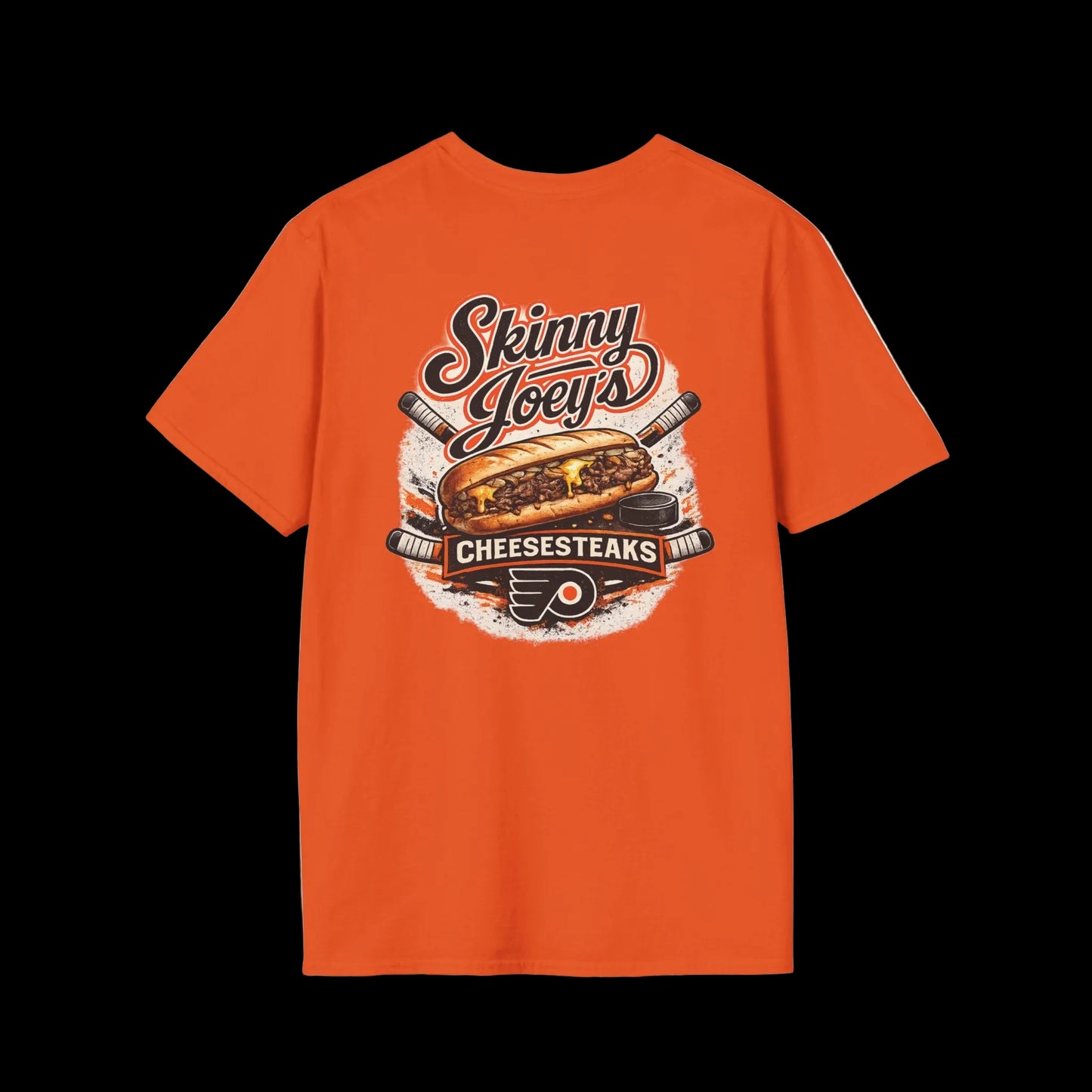 Orange t-shirt with 'Skinny Joey's Cheesesteaks' graphic on a white background
