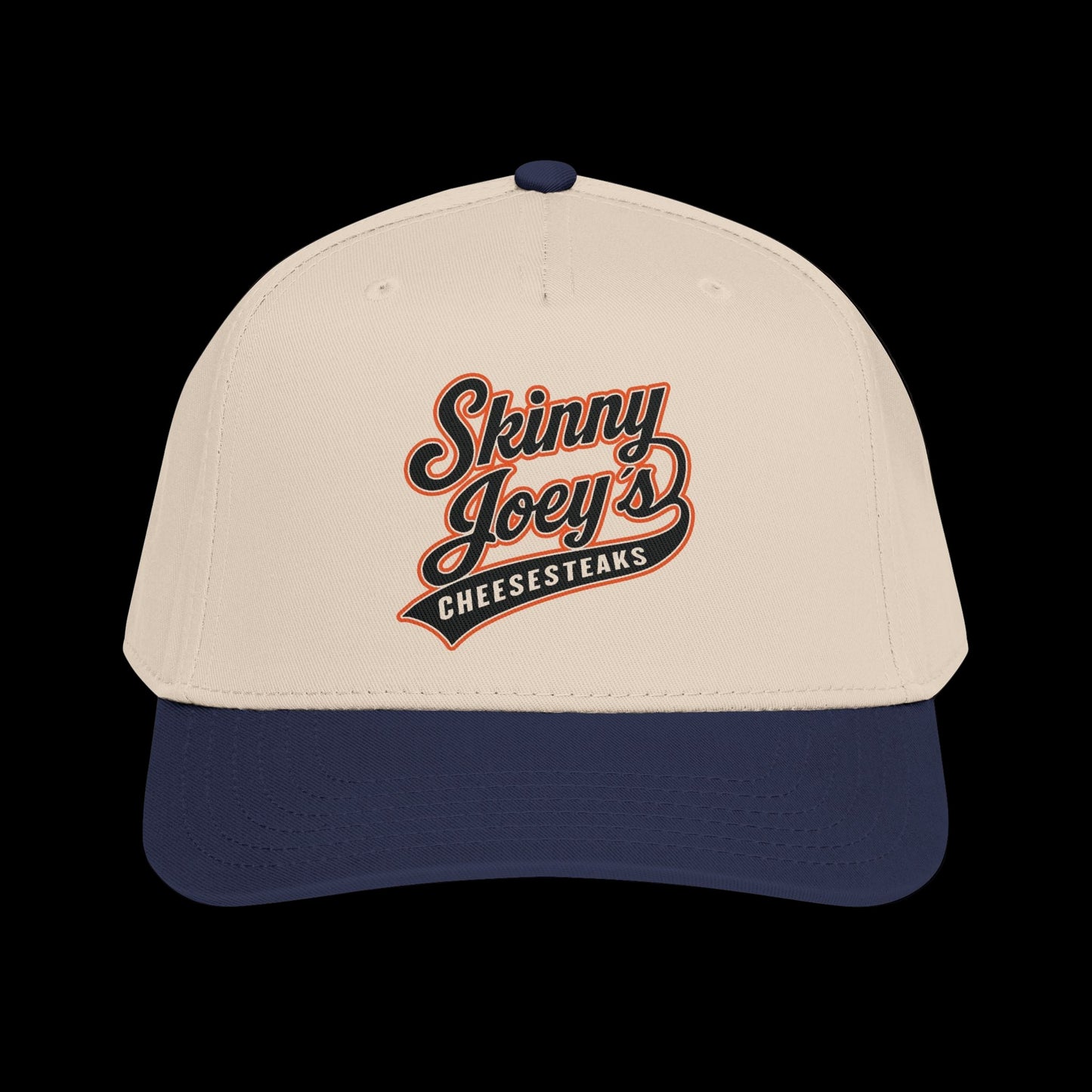 Beige and navy cap with 'Skinny Joey's Cheesesteaks' text on a white background