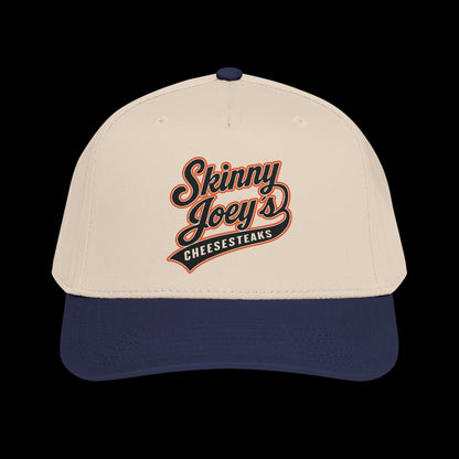 Beige and navy cap with 'Skinny Joey's Cheesesteaks' text on a white background