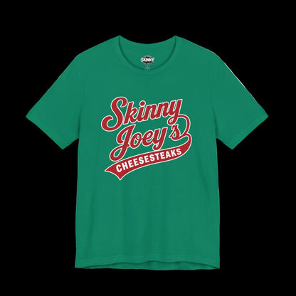 Green t-shirt with 'Skinny Joey's Cheesesteaks' text on a white background