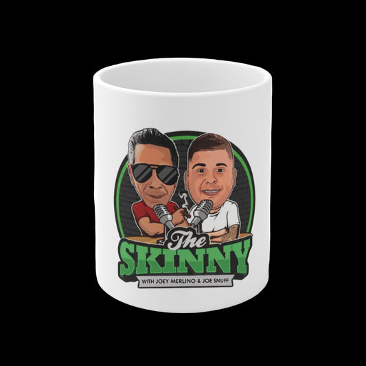 White mug with 'The Skinny' graphic featuring two caricatures and text on a white background