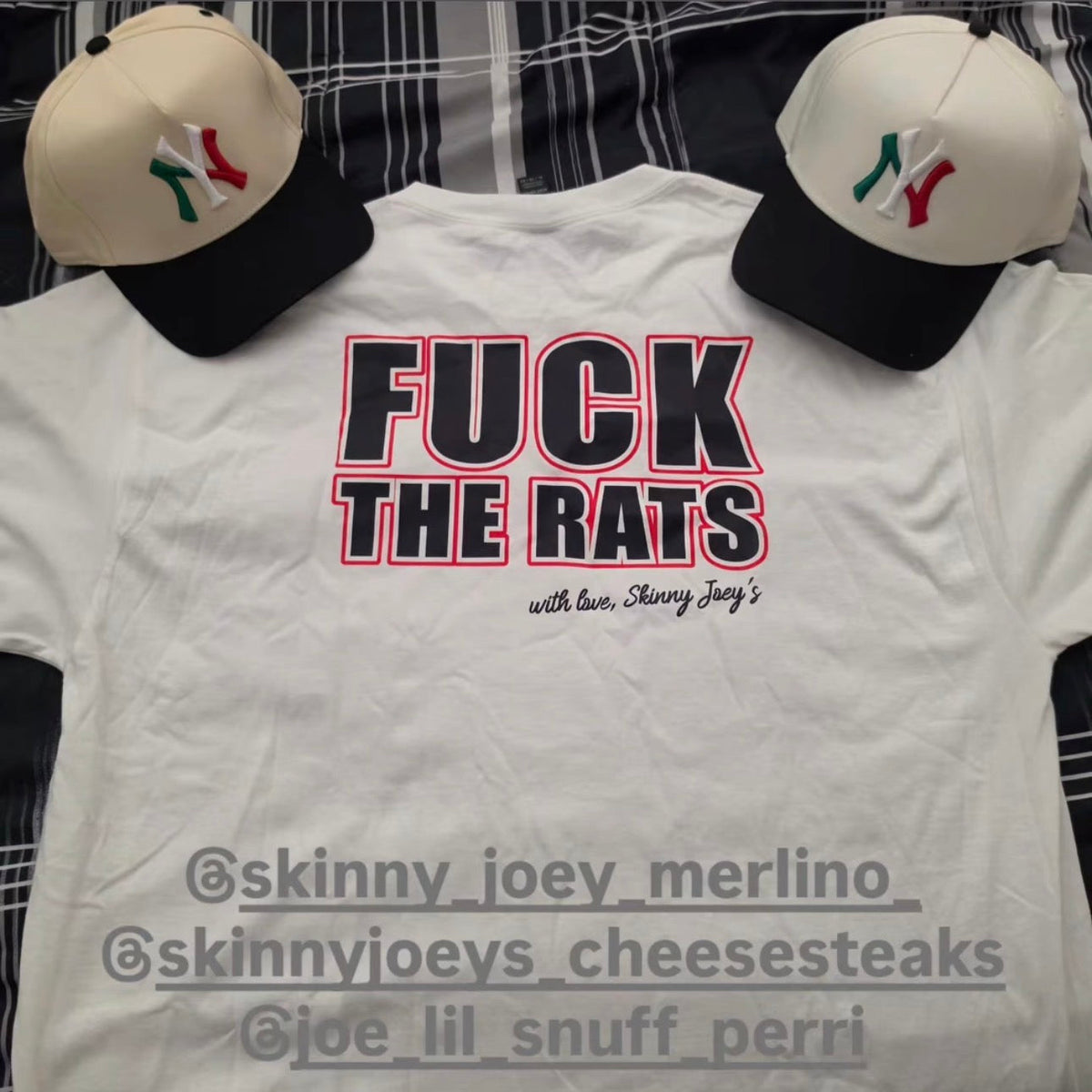 Rats Statement graphic tee in white, flat-lay with two caps, Skinny Joey Philadelphia mob boss inspired merch