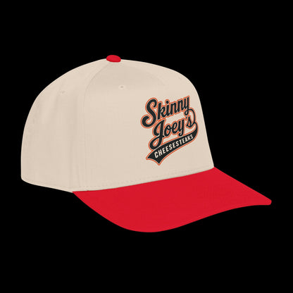 Beige and red cap with 'Skinny Joey's Cheesesteaks' logo on a black background