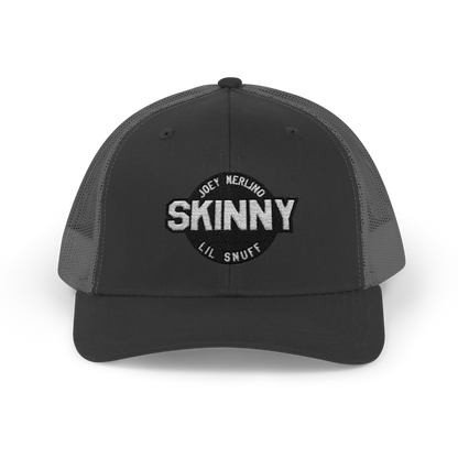Black trucker cap with 'Skinny' logo on a white background