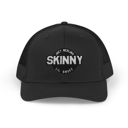 Black trucker cap with 'SKINNY' branding on a white background