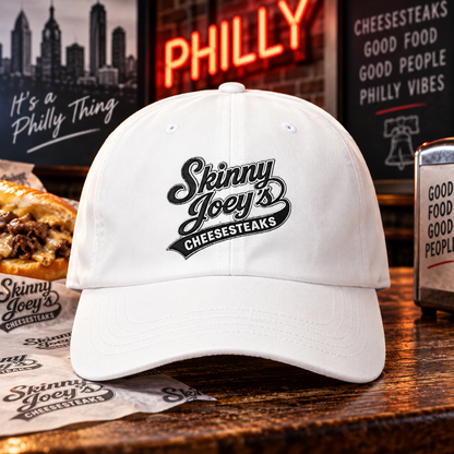 Skinny Joey's Cheesesteaks embroidered dad cap in white, Philly crime family culture apparel