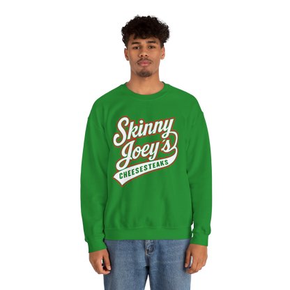 Person wearing a green 'Skinny Joey's Cheesesteaks' sweatshirt on a white background