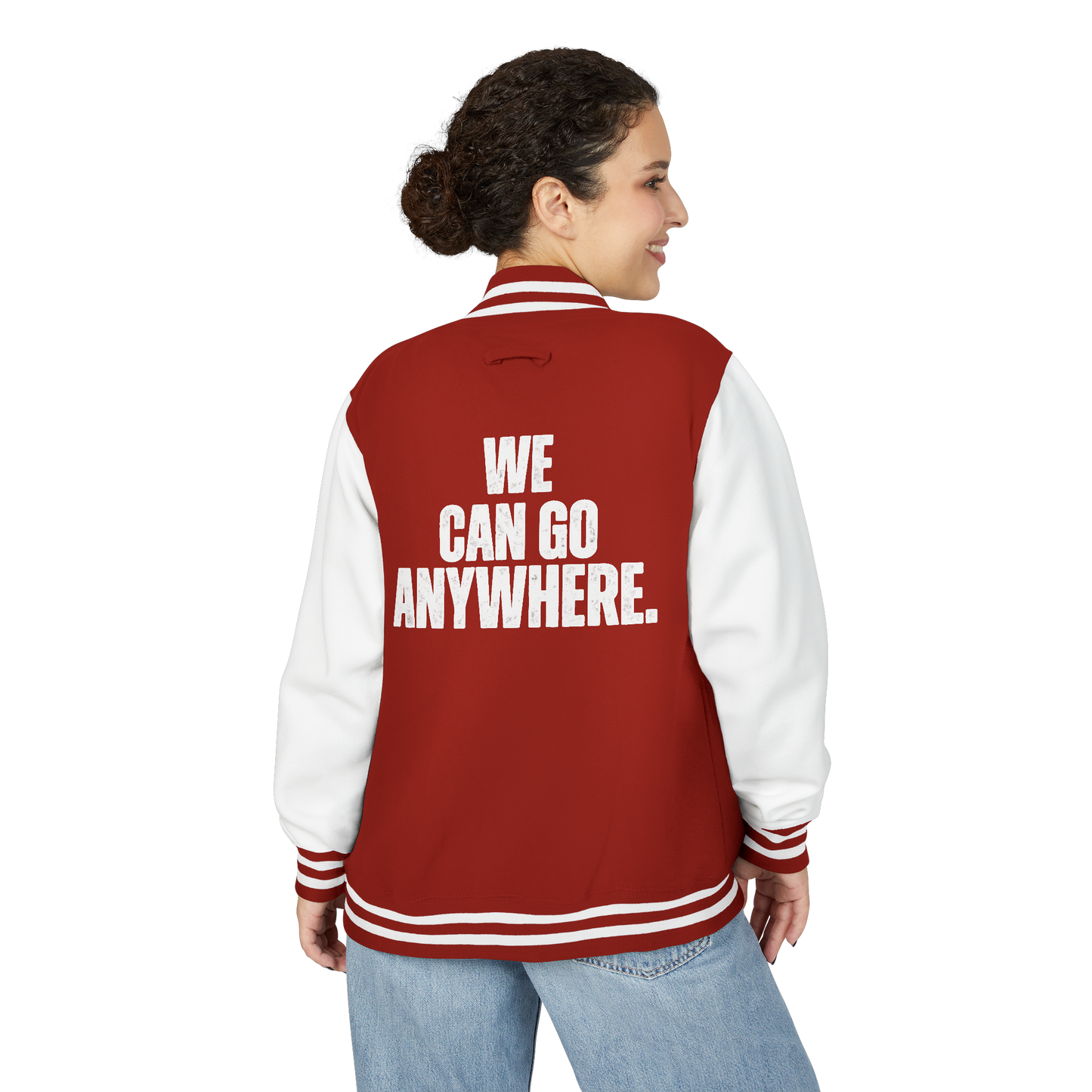 Person wearing a red and white letterman jacket with 'WE CAN GO ANYWHERE.' text on the back.