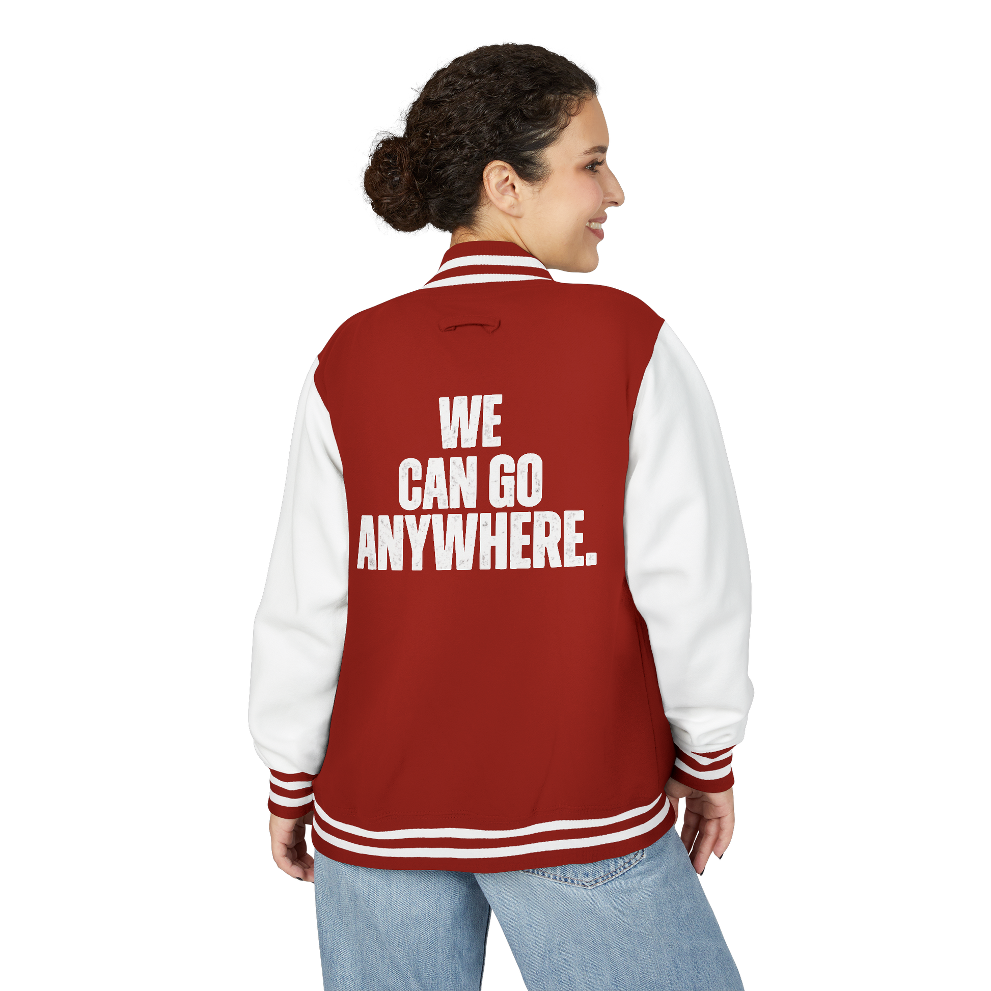 Person wearing a red and white letterman jacket with 'WE CAN GO ANYWHERE.' text on the back.