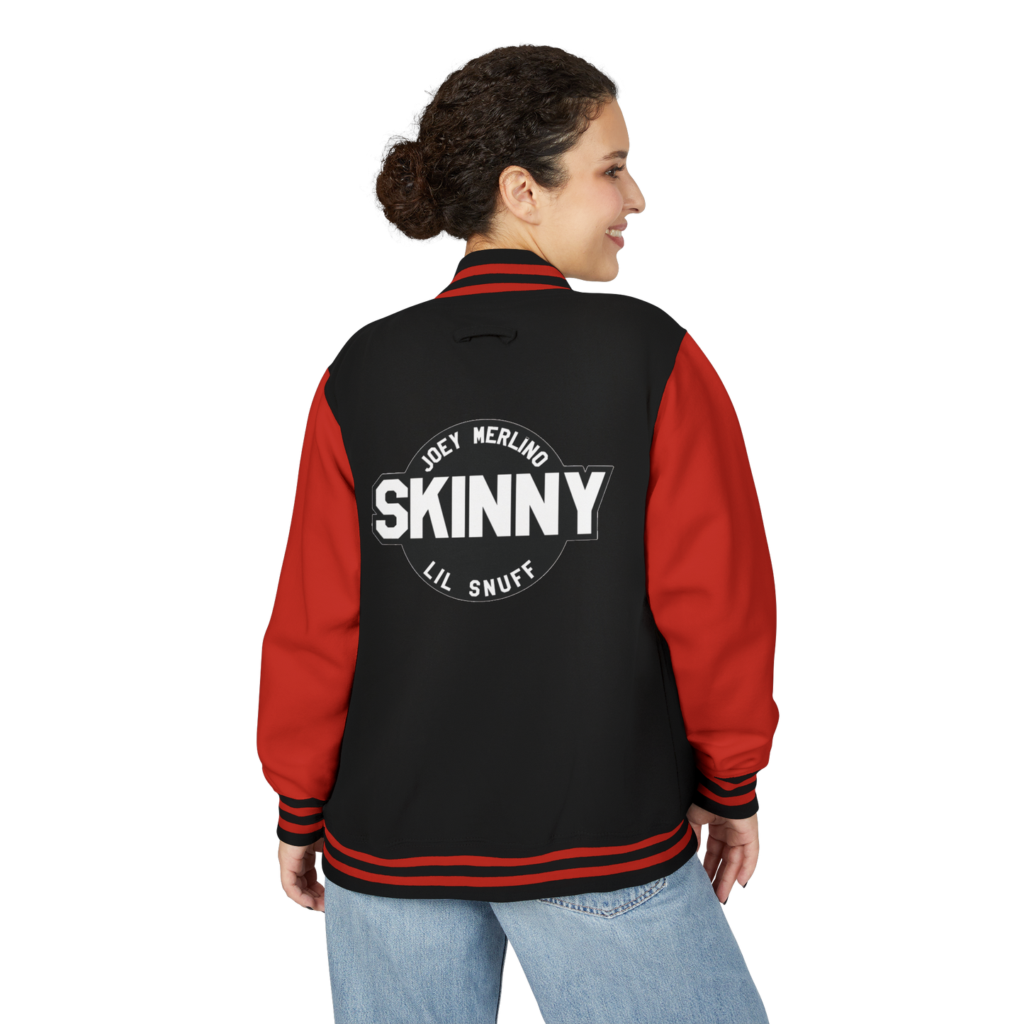 Person wearing a black and red jacket with 'Skinny' text on the back, on a white background