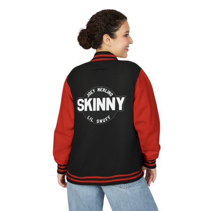 Person wearing a black and red jacket with 'Skinny' text on the back, on a white background