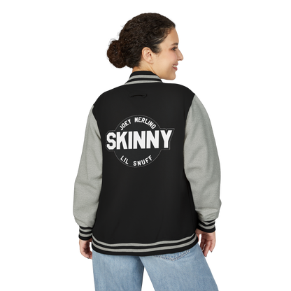 Person wearing a black and gray varsity jacket with 'SKINNY' text on the back.