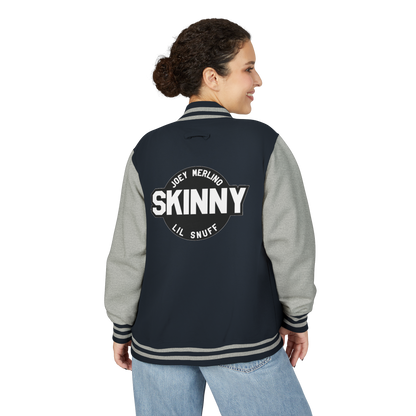 Person wearing a navy and gray varsity jacket with 'SKINNY' text on the back.