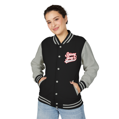 Person wearing a black and gray varsity jacket with a logo on a white background