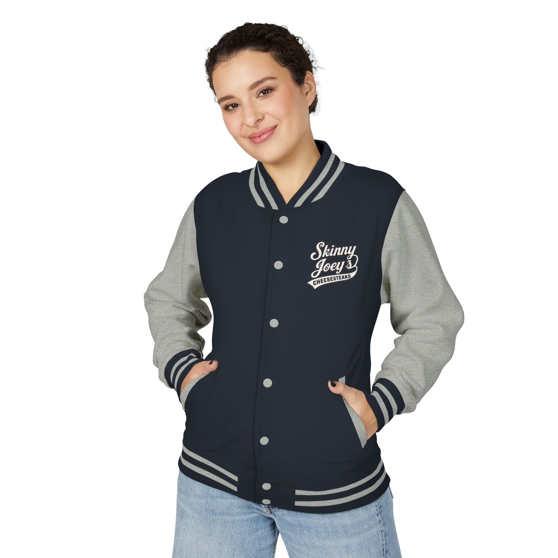 Person wearing a navy and gray varsity jacket with 'Skinny Joey's' logo on a white background