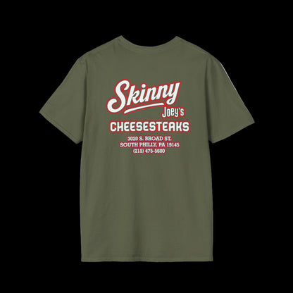 Green t-shirt with red text on a white background